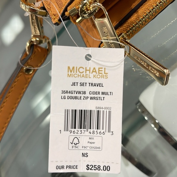 MICHAEL KORS JST LG DOUBLE ZIP WRISTLET WALLET PHONE HOLDER
CIDER
NWT - Picture 9 of 16